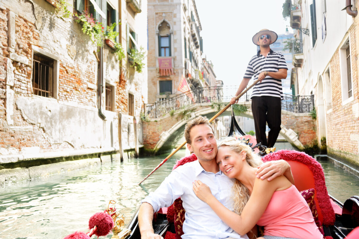 Romantic,Travel,Couple,In,Venice,On,Gondole,Ride,Romance,In